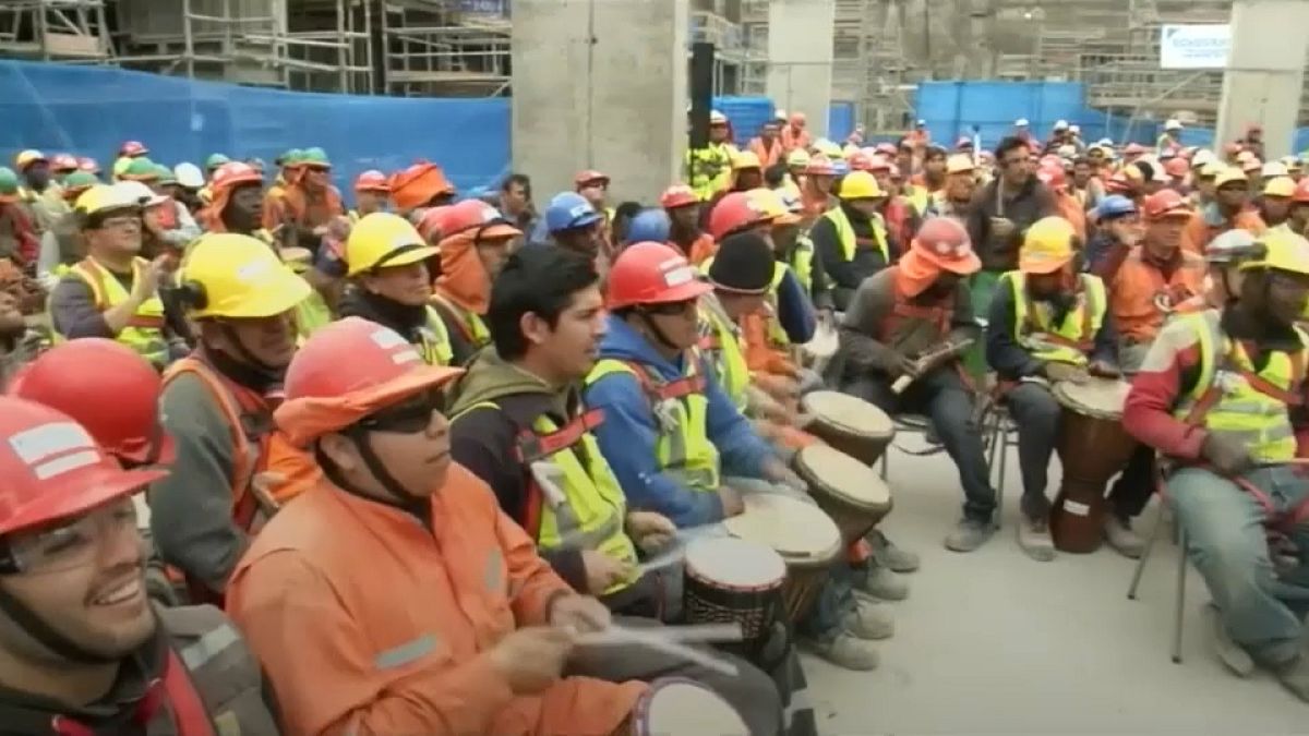 Chilean construction workers relieve stress with percussion