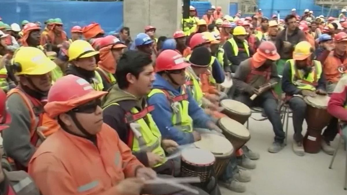 Construction workers use drums to de-stress in Chile 