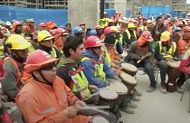 Construction workers use drums to de-stress in Chile
