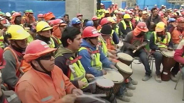 Construction workers use drums to de-stress in Chile Construction workers use drums to de-stress in Chile