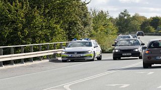 سيارة شرطة على طريق سريع في الدنمرك يوم الجمعة