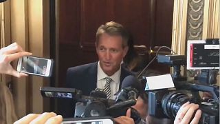 Jeff Flake confronted by sexual assault survivors after he backs Kavanaugh