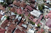 Vítimas mortais enterradas em valas comuns na Indonésia