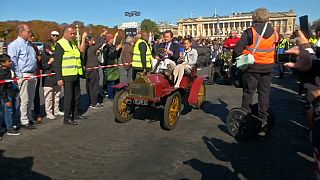 Vintage cars hit the streets of Paris for the city's 120th motor show