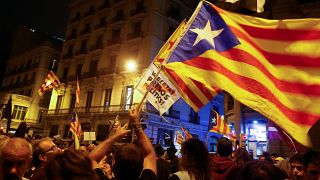 Tensions rise as large protests mark Catalonia referendum anniversary