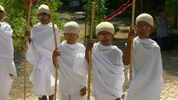 Indian children dress as Gandhi to mark 150th anniversary of independence leader's birth