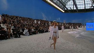 Catwalk turned into beach for Paris Fashion Week show