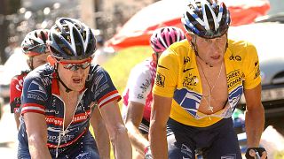 Floyd Llandis (L) and Lance Armstrong (R) at the 2004 Tour de France.