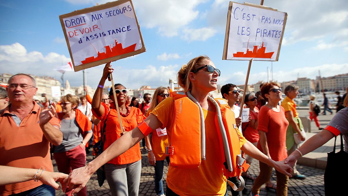 Thousands in France call for migrant rescue ship to be saved