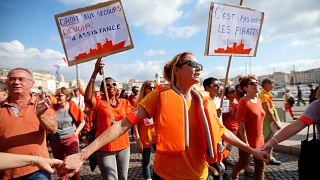 Thousands in France call for migrant rescue ship to be saved