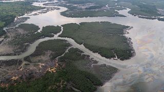  the Niger delta where signs of oil spills can be seen in Port Harcourt
