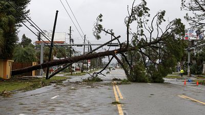 Hurricane Michael moves inland, leaving devastation behind