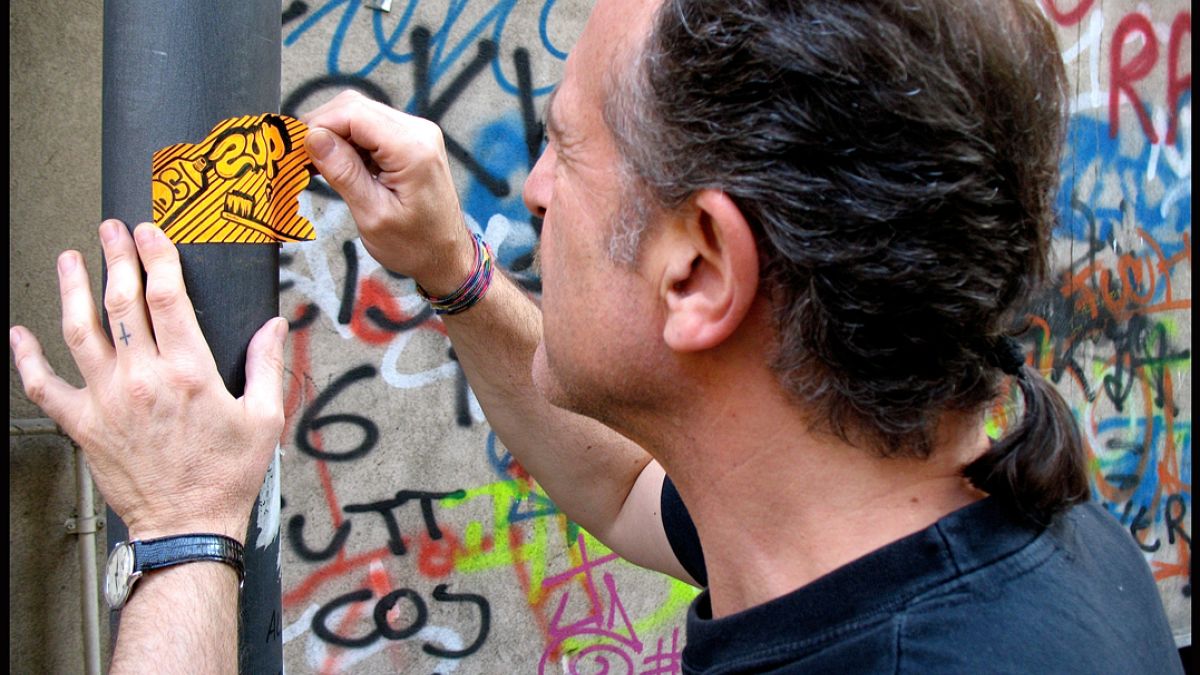From 'graffiti hunter' to champion of Naples' street art 