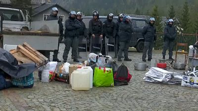 الشرطة الإيطالية تخلي مخيم مهاجرين