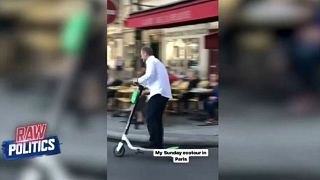 Donald Tusk tears through Paris on a scooter