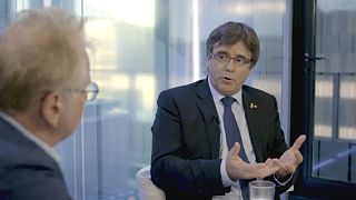 Stop treating Catalonia's separatists like criminals, exiled Puigdemont tells Euronews 