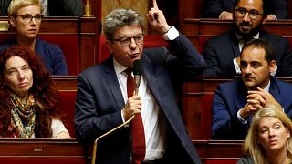 Raw Politics: French left leader Jean-Luc Mélenchon reacts angrily to police raids