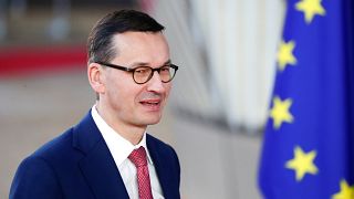 EU top court rules to freeze Poland's overhaul of Supreme Court