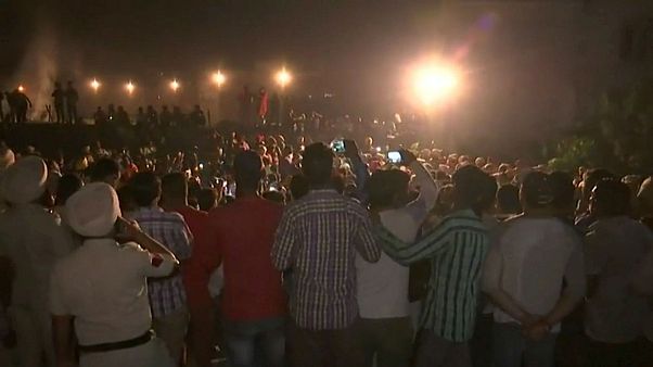 Train runs over crowd on tracks in northern India, 50 feared dead Train runs over crowd on tracks in northern India, 50 feared dead