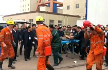 Two dead, 18 trapped in mine collapse in China