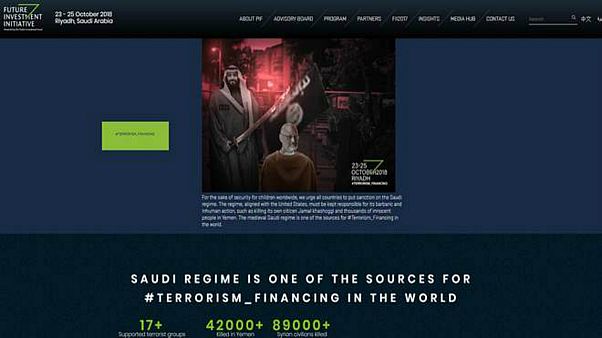 هاكرز يضعون صورة خاشقجي ومحمد بن سلمان على موقع "مؤتمر الاستثمار السعودي" هاكرز يضعون صورة خاشقجي ومحمد بن سلمان على موقع "مؤتمر الاستثمار السعودي"