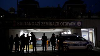 Police outside the car park where a Saudi diplomatic car was found.