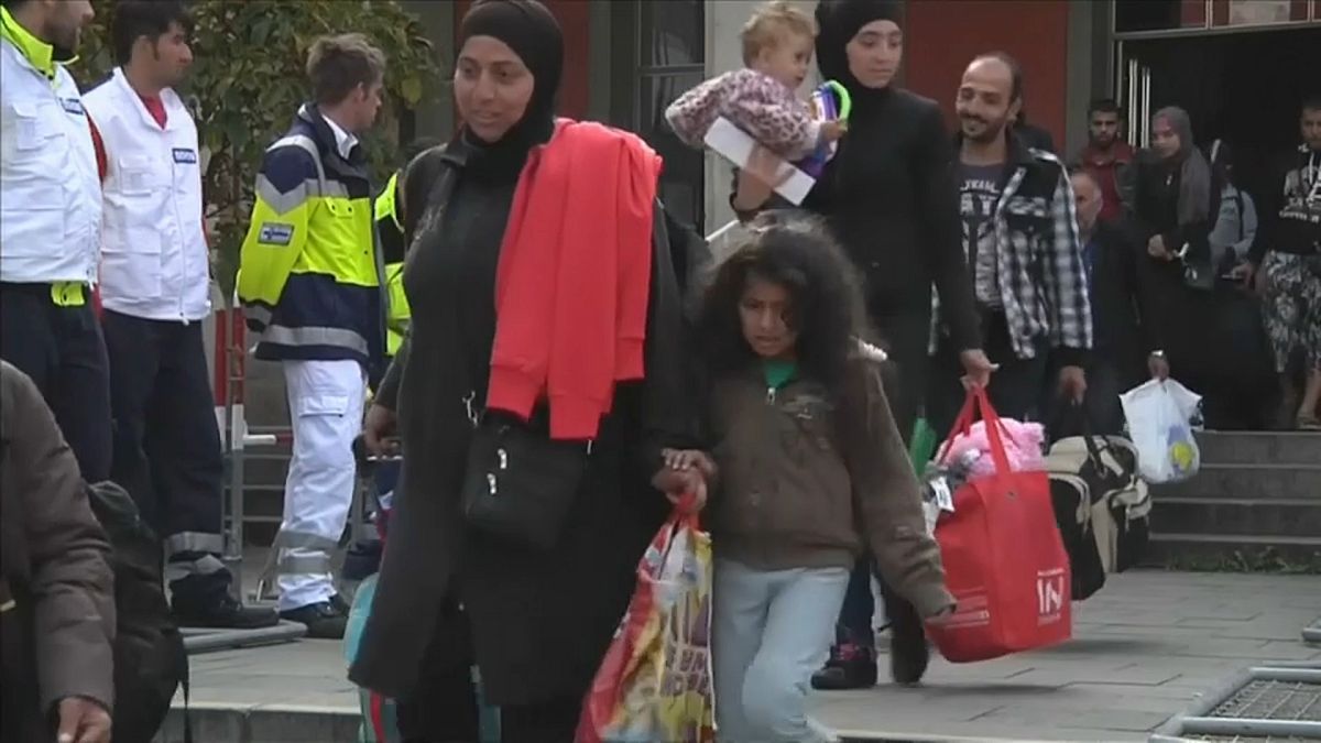 Ankommende muslimische Flüchtlingsfamilien