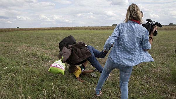 Hungarian court aquits camerawoman who tripped and kicked migrants Hungarian court aquits camerawoman who tripped and kicked migrants