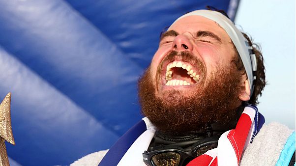 Adventurer becomes first person to swim around Britain Adventurer becomes first person to swim around Britain