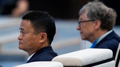 Microsoft founder Bill Gates (R) and Jack Ma, CEO of Alibaba