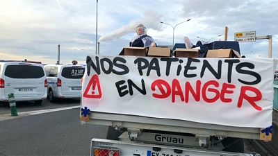 French ambulances block Paris highway for second day, protesting reforms