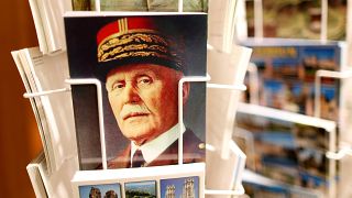 A postcard featuring Petain for sale in a souvenir shop near Verdun