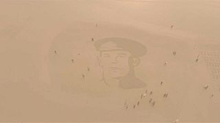 Portrait of World War One soldier engraved on UK beach