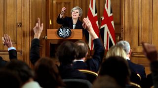 Theresa May takes questions during a news conference