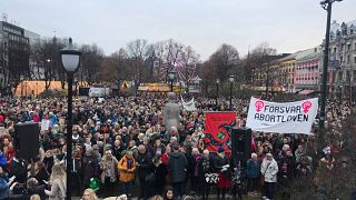 Norwegians protest against restricting abortion as PM tries to cling to power