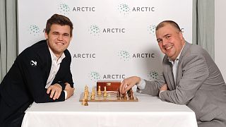 Chess grandmaster Magnus Carlsen (left) with Carl Fredrik Johansson.