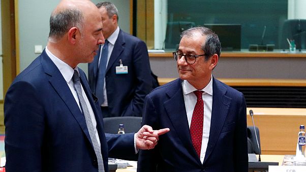 O comissário europeu Pierre Moscovici com o ministro Giovanni Tria O comissário europeu Pierre Moscovici com o ministro Giovanni Tria