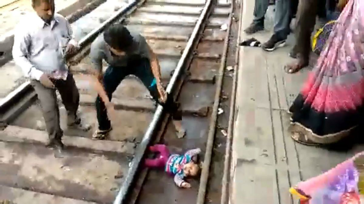 Watch: Baby in India survives after being 'run over' by train