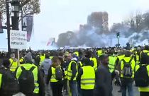 Police fire tear gas at yellow vest protesters in Paris