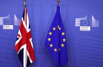 British and EU flags at the EC headquarters in Brussels