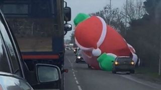 It's a ho ho hold up — giant inflatable Santa blocks traffic in UK