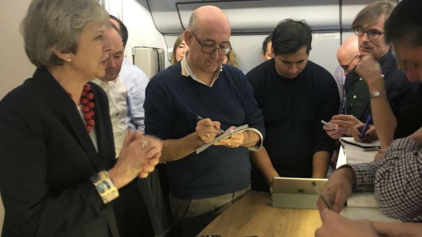 Theresa May gives a press conference on board her plane Theresa May gives a press conference on board her plane