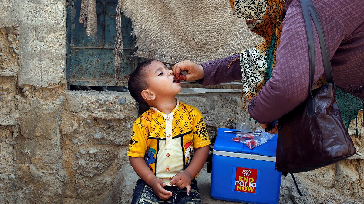 Boy receives polio vaccine drops, Karachi, Pakistan April 9, 2018.