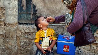 Boy receives polio vaccine drops, Karachi, Pakistan April 9, 2018.