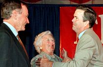 Former President George Bush (L), wife Barbara and son Jeb Bush