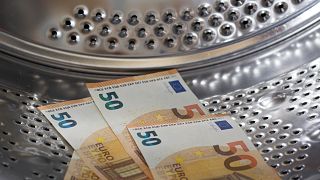 Money laundering - washing money in a washing machine