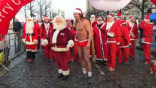 Hundreds of Santas dash around the English city of Liverpool