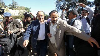 A member of the Houthi delegation departs for talks in Sweden