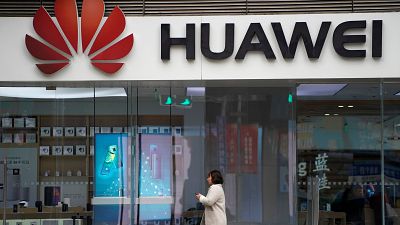 Stocks slide as Huawei arrest risks new strains in U.S.-China ties
