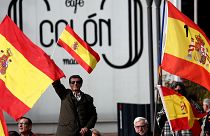 People gather at a rally calling for Spanish national unity in Madrid.